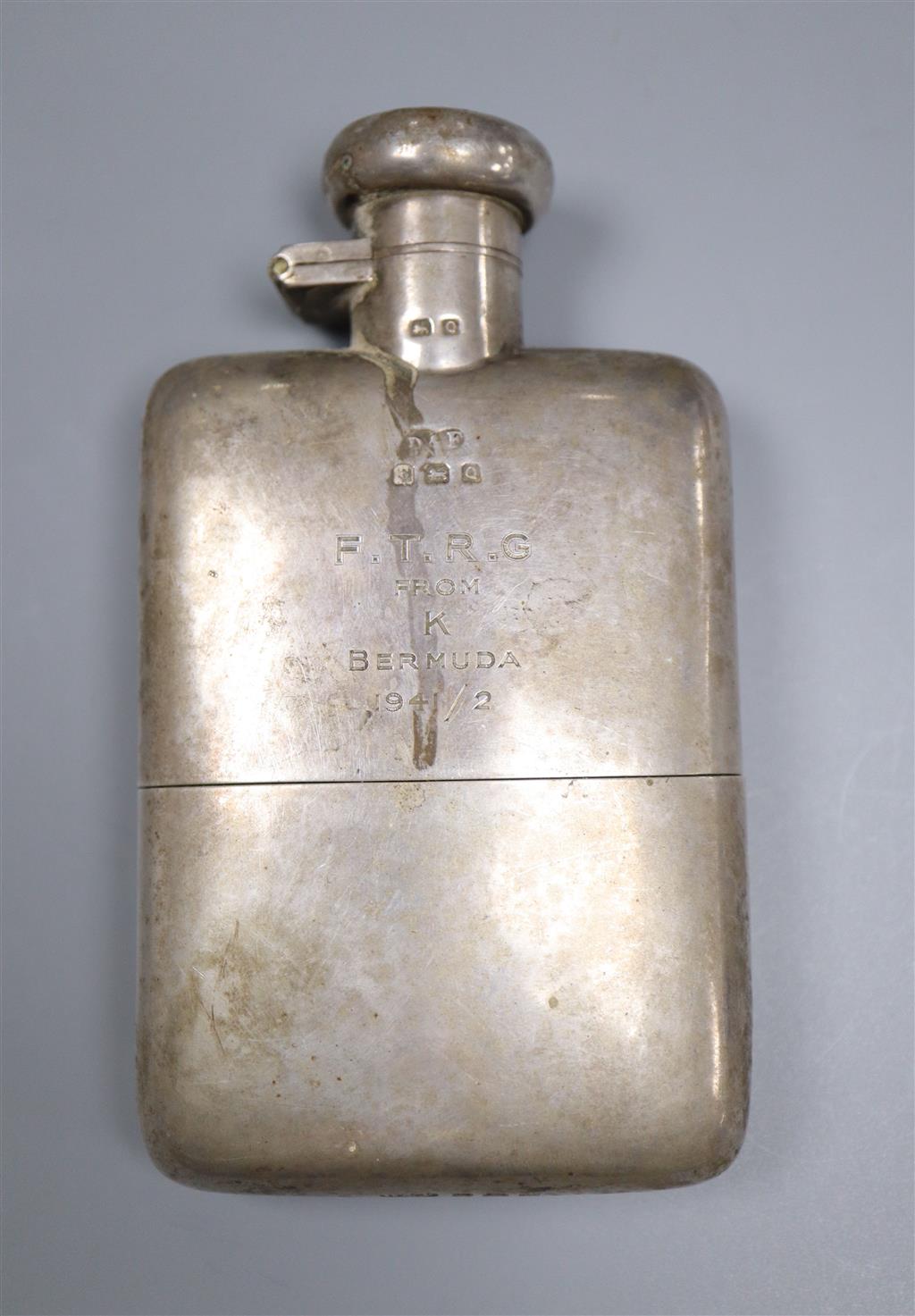 A George V silver hip flask, with engraved inscription, Deakin & Francis, Birmingham, 1940, 12.5cm, gross 6oz.